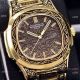 Clone Patek Philippe Nautilus Gold Tattoo Wrist Malachite Green Dial (9)_th.jpg